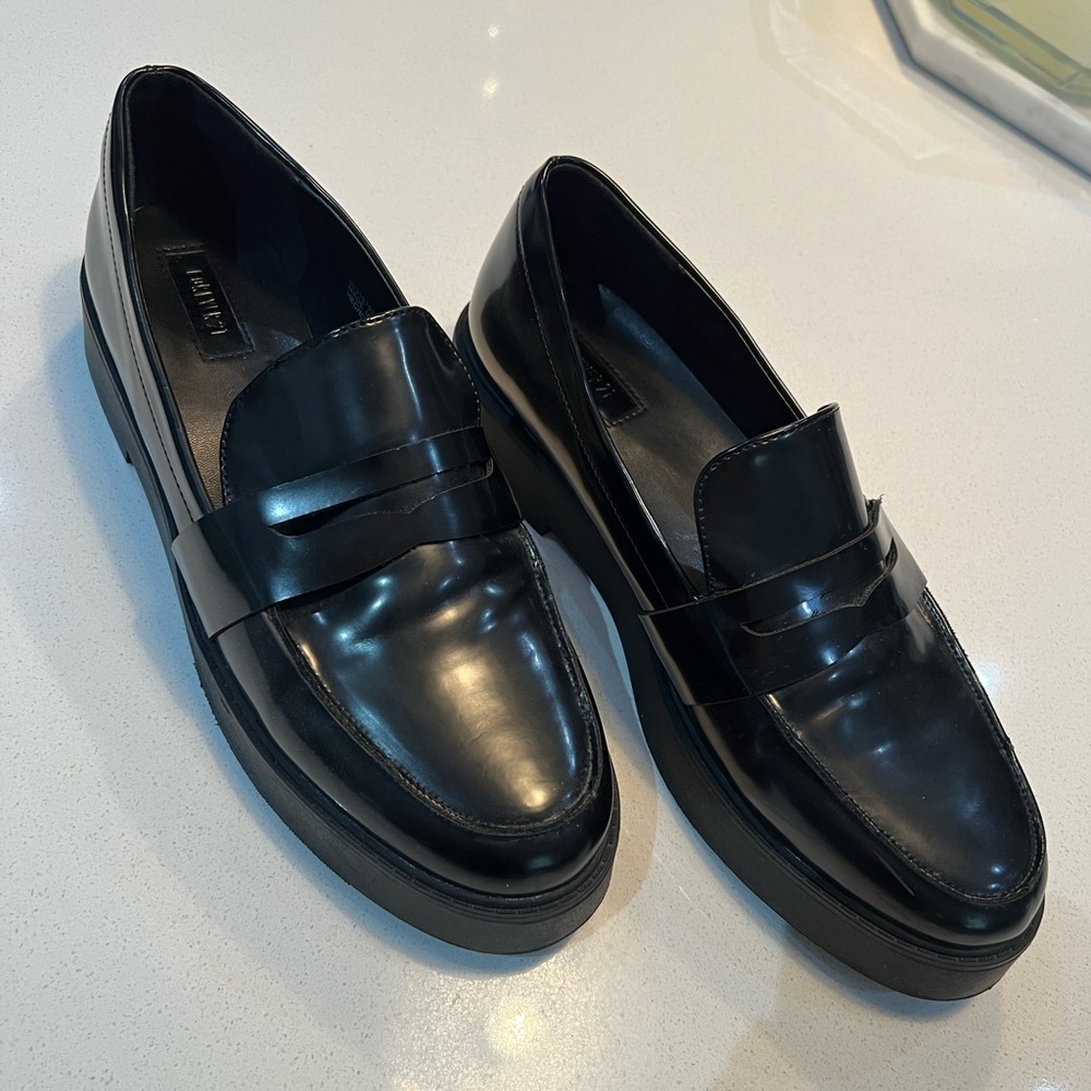 Forever 21 Black slightly platform loafers. Size 10